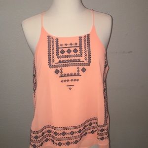 Fun and flirty coral tank